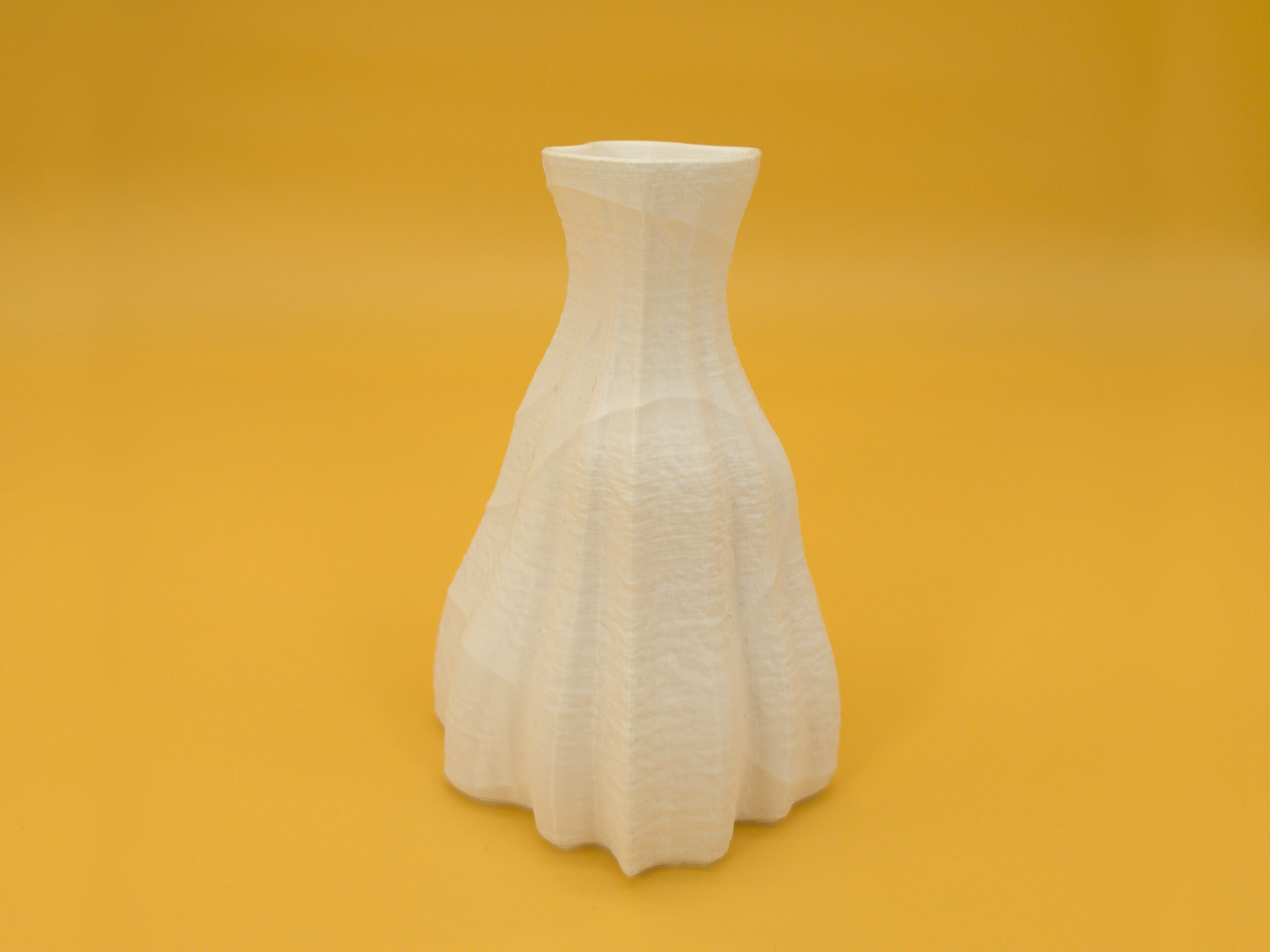 20250909_dual_texture_vase_back Back view of eco-friendly, pleasing, white vase for dry decoration that features durability and a dual texture with an asymmetric shape!