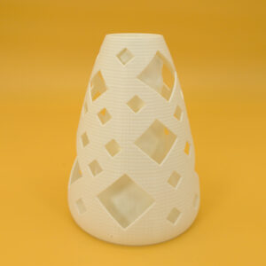 Front view of eco-friendly, pleasing, unique vase for dry decor that features durability with diamond and small circular geometric features!